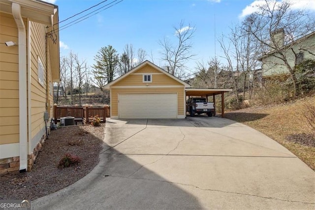 view of property exterior featuring a garage, cooling unit, and an outdoor structure