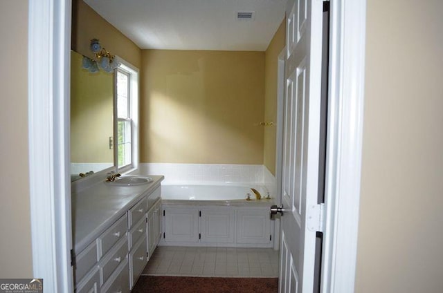 full bath featuring a bath and vanity