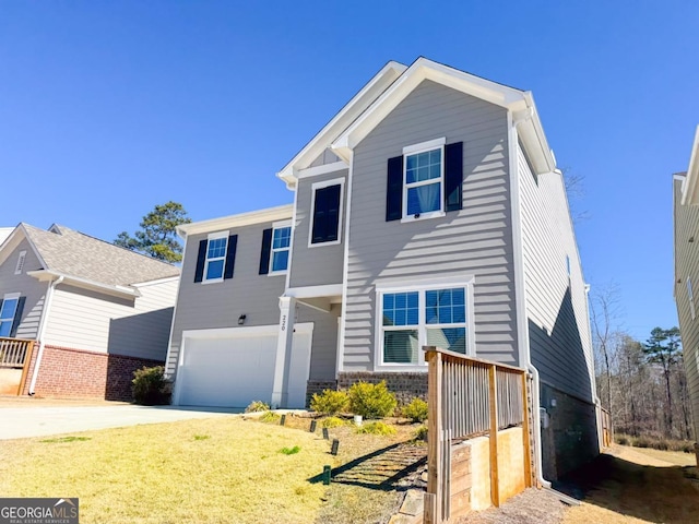 view of front of property with a garage and driveway