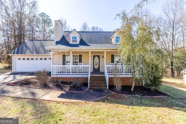 cape cod house featuring driveway, a garage, a chimney, a porch, and a front lawn