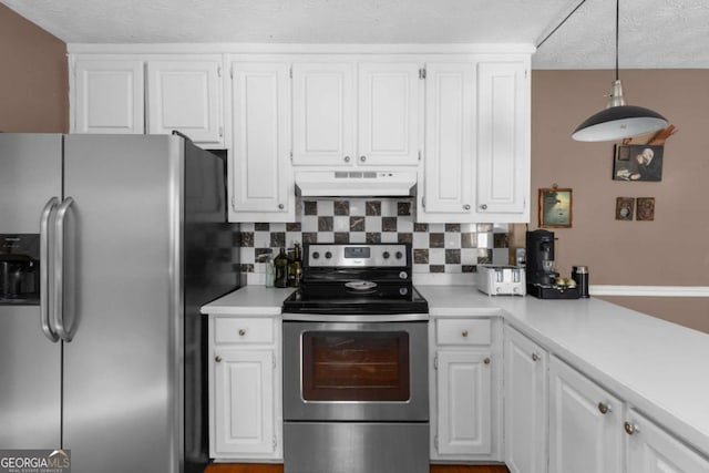 kitchen featuring stainless steel appliances, light countertops, white cabinetry, and under cabinet range hood