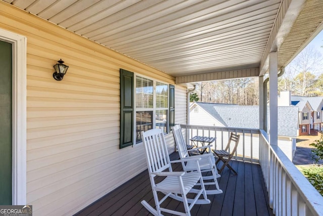 wooden deck featuring a porch