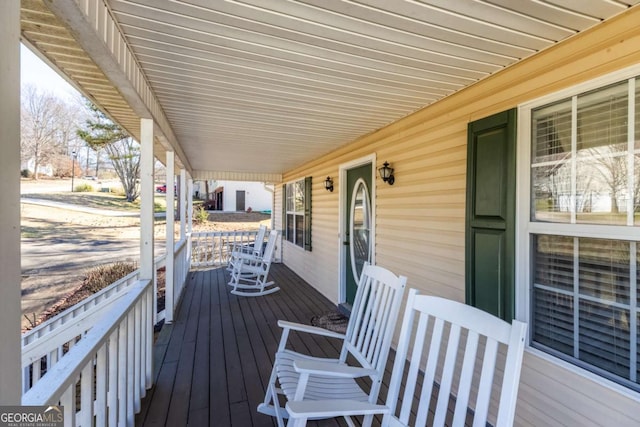 wooden deck with a porch