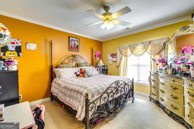 bedroom featuring carpet floors, ornamental molding, visible vents, and baseboards