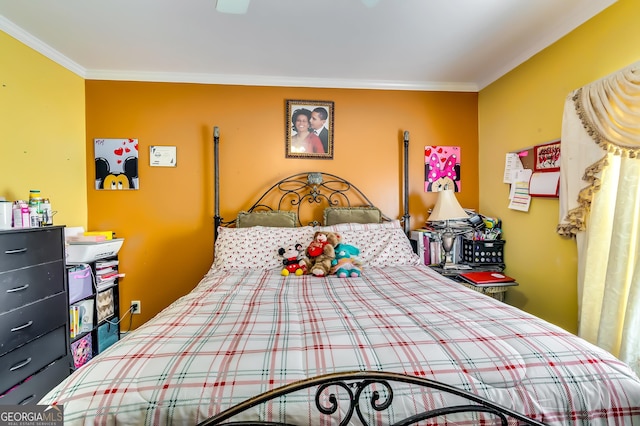 bedroom with ornamental molding