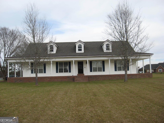 farmhouse featuring a front lawn and a porch