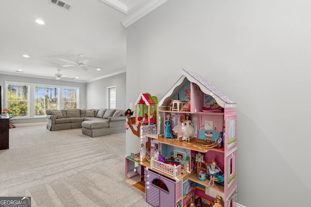 playroom with visible vents, ceiling fan, ornamental molding, carpet flooring, and recessed lighting