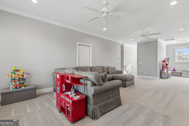 carpeted living area featuring recessed lighting, ornamental molding, attic access, a ceiling fan, and baseboards