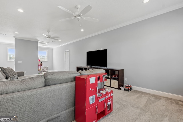 living area featuring recessed lighting, carpet floors, a ceiling fan, baseboards, and ornamental molding