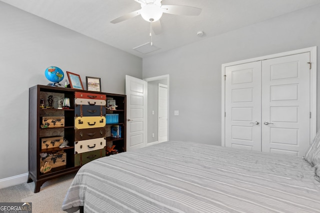 bedroom with ceiling fan, a closet, and light colored carpet