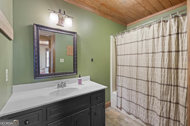 full bath with shower / bath combo, wood ceiling, crown molding, and vanity