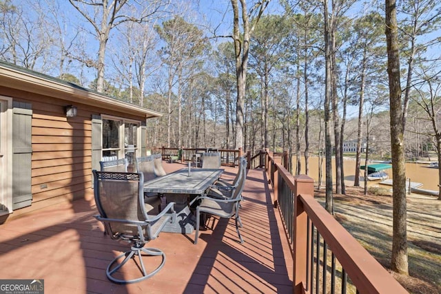 deck featuring outdoor dining space