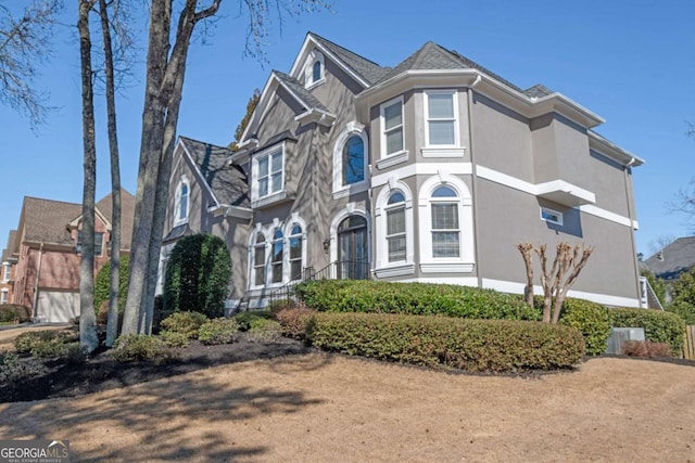 view of front of house featuring stucco siding