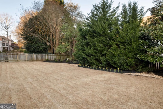 view of yard with fence