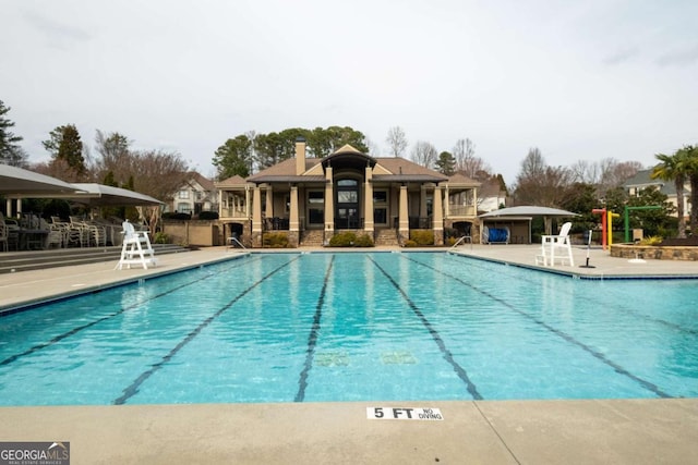 pool featuring a patio