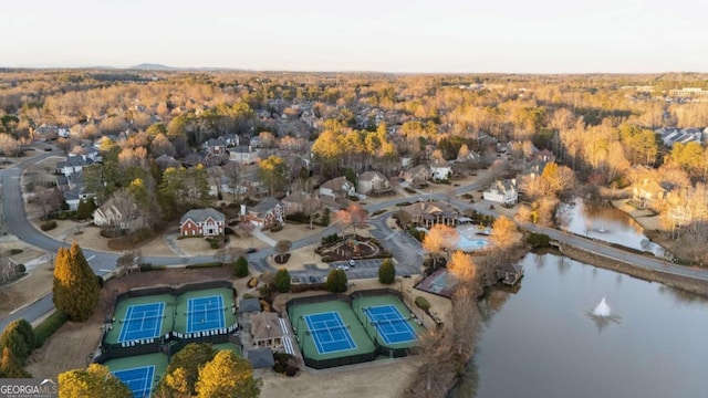 bird's eye view with a water view and a residential view