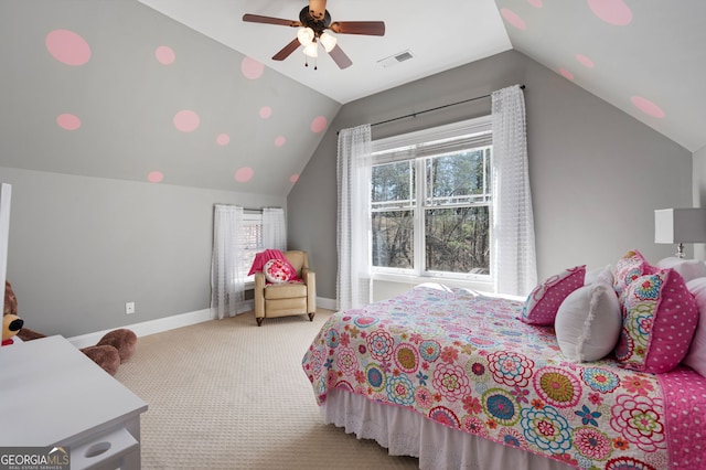 carpeted bedroom featuring lofted ceiling, baseboards, visible vents, and ceiling fan