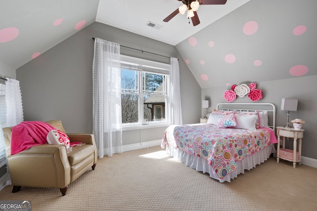 carpeted bedroom with lofted ceiling, a ceiling fan, visible vents, and baseboards