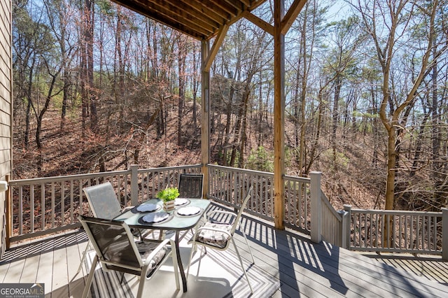 deck with outdoor dining space