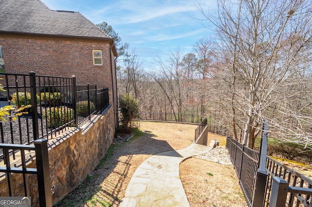 view of yard featuring a fenced backyard