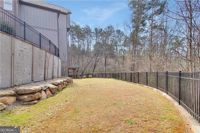 view of yard featuring a fenced backyard