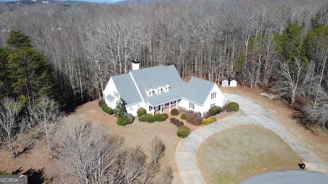 aerial view with a wooded view