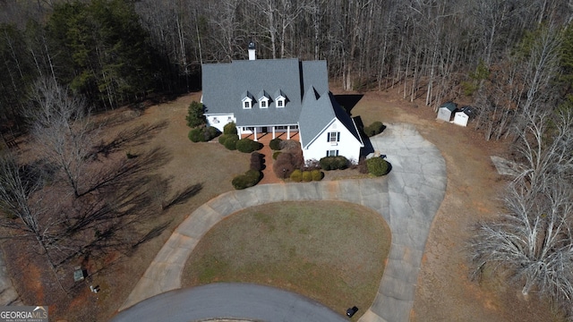 aerial view featuring a view of trees