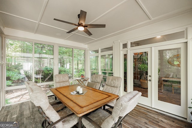 sunroom / solarium featuring ceiling fan and french doors