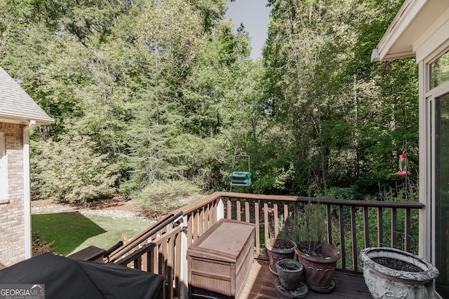 wooden deck featuring grilling area