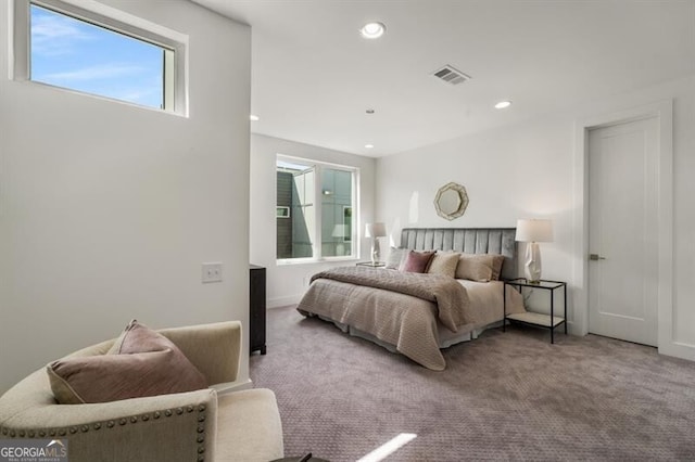 bedroom with carpet floors, visible vents, and recessed lighting