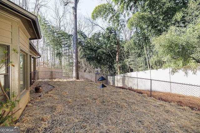 view of yard featuring a fenced backyard