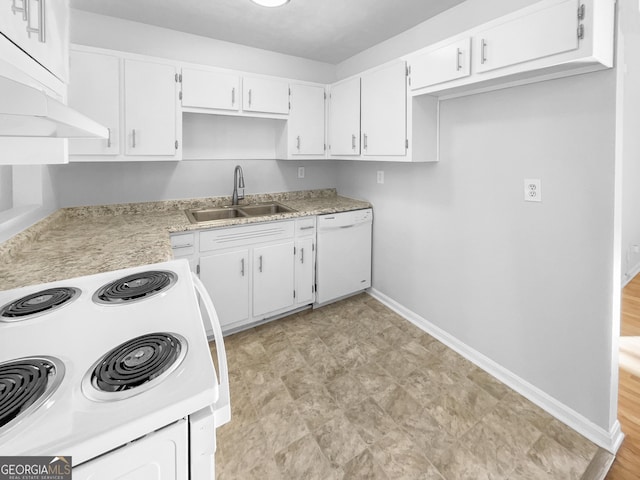 kitchen featuring light countertops, white cabinets, a sink, white appliances, and under cabinet range hood