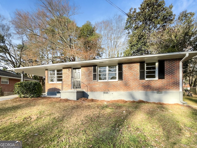 single story home featuring crawl space, brick siding, a front lawn, and an attached carport