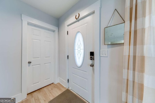 entrance foyer featuring light wood-type flooring