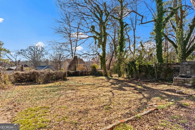 view of yard with fence