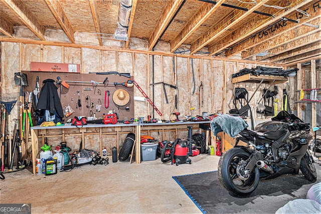 garage with a workshop area