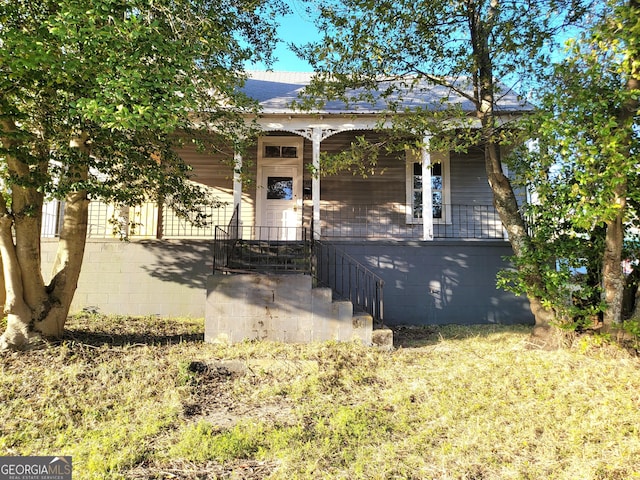 bungalow-style home with covered porch