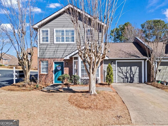 view of front of house with concrete driveway, brick siding, and an attached garage