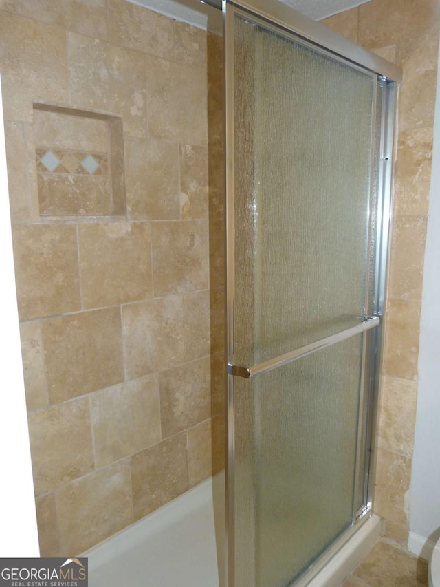 3527 Essex Ave Unit 74, Atlanta, GA 30339 - bathroom featuring a shower stall