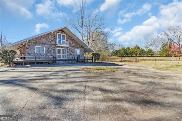 view of front of home with stone siding