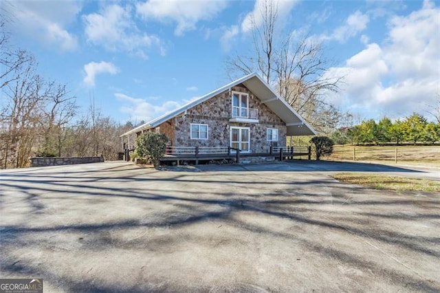 view of front of house with stone siding