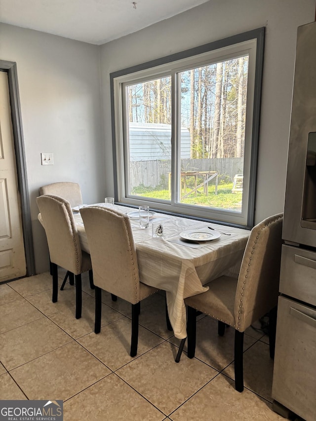 dining room with light tile patterned floors