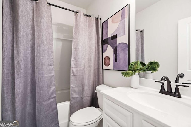 full bathroom with shower / bath combo with shower curtain, vanity, and toilet