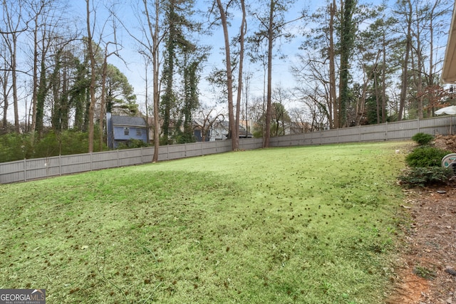 view of yard featuring a fenced backyard