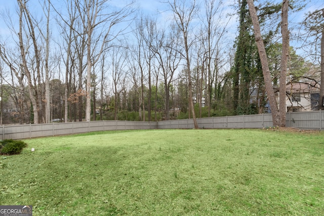 view of yard featuring a fenced backyard