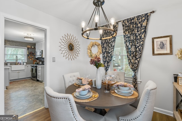 dining area featuring an inviting chandelier