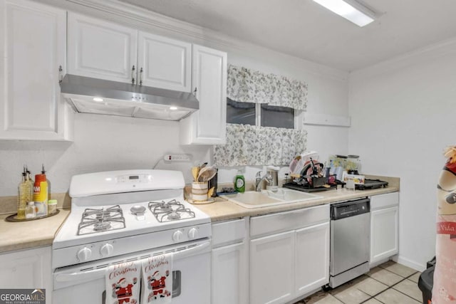 kitchen featuring stainless steel dishwasher, white cabinetry, a sink, under cabinet range hood, and white gas range oven