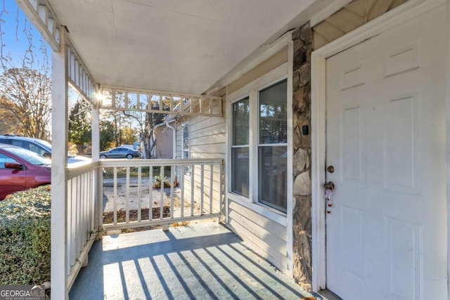 wooden deck featuring a porch