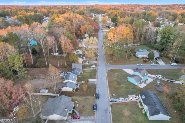 drone / aerial view with a view of trees