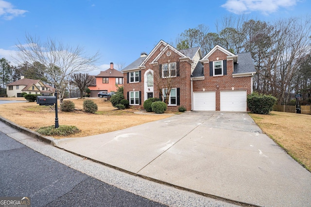 view of front of property featuring brick siding, a shingled roof, concrete driveway, a front lawn, and a chimney